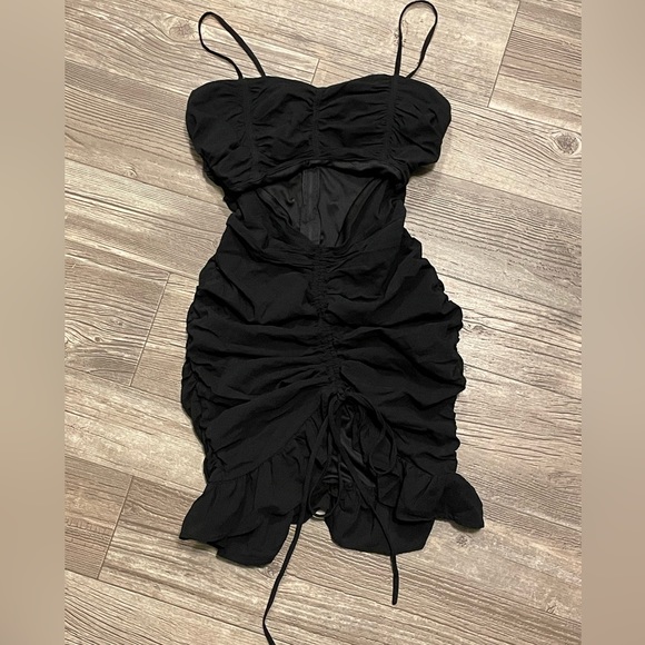 Every girl needs a Black Ruched Mini dress and here it is , it’s all yours !! - Picture 1 of 1
